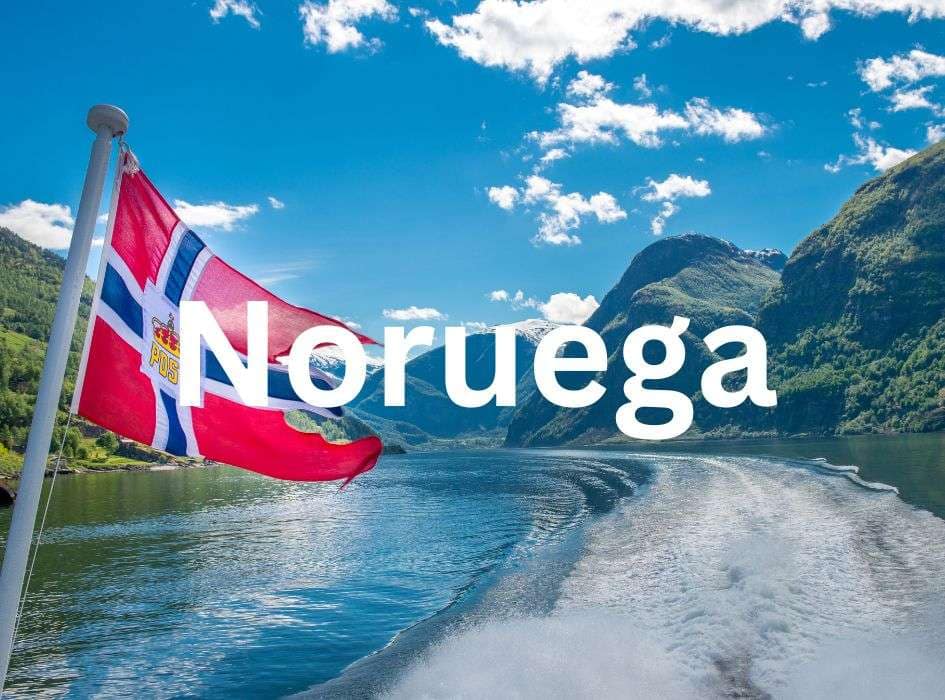 Año académico en Noruega Jetstream de un barco surcando los fiordos noruegos con la bandera noruega ondeando al viento